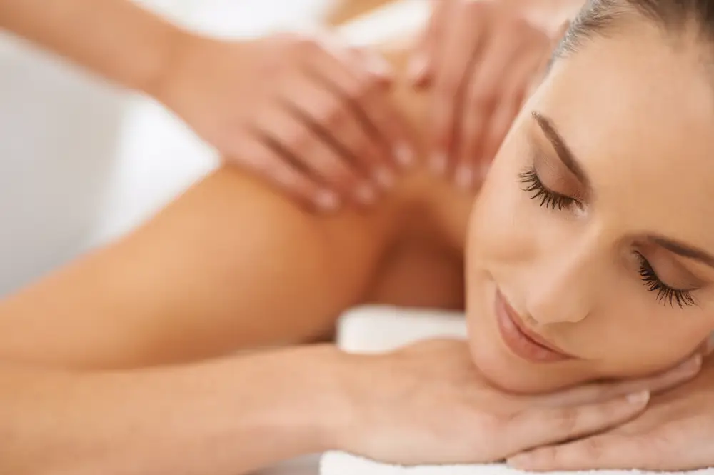 beautiful woman having a shoulder massage